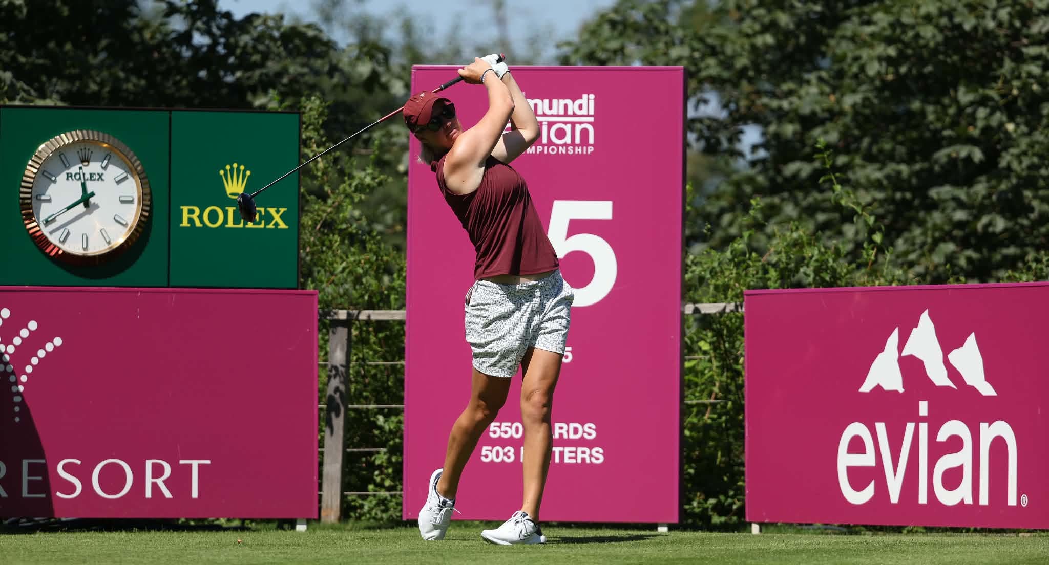 Nicole playing golf